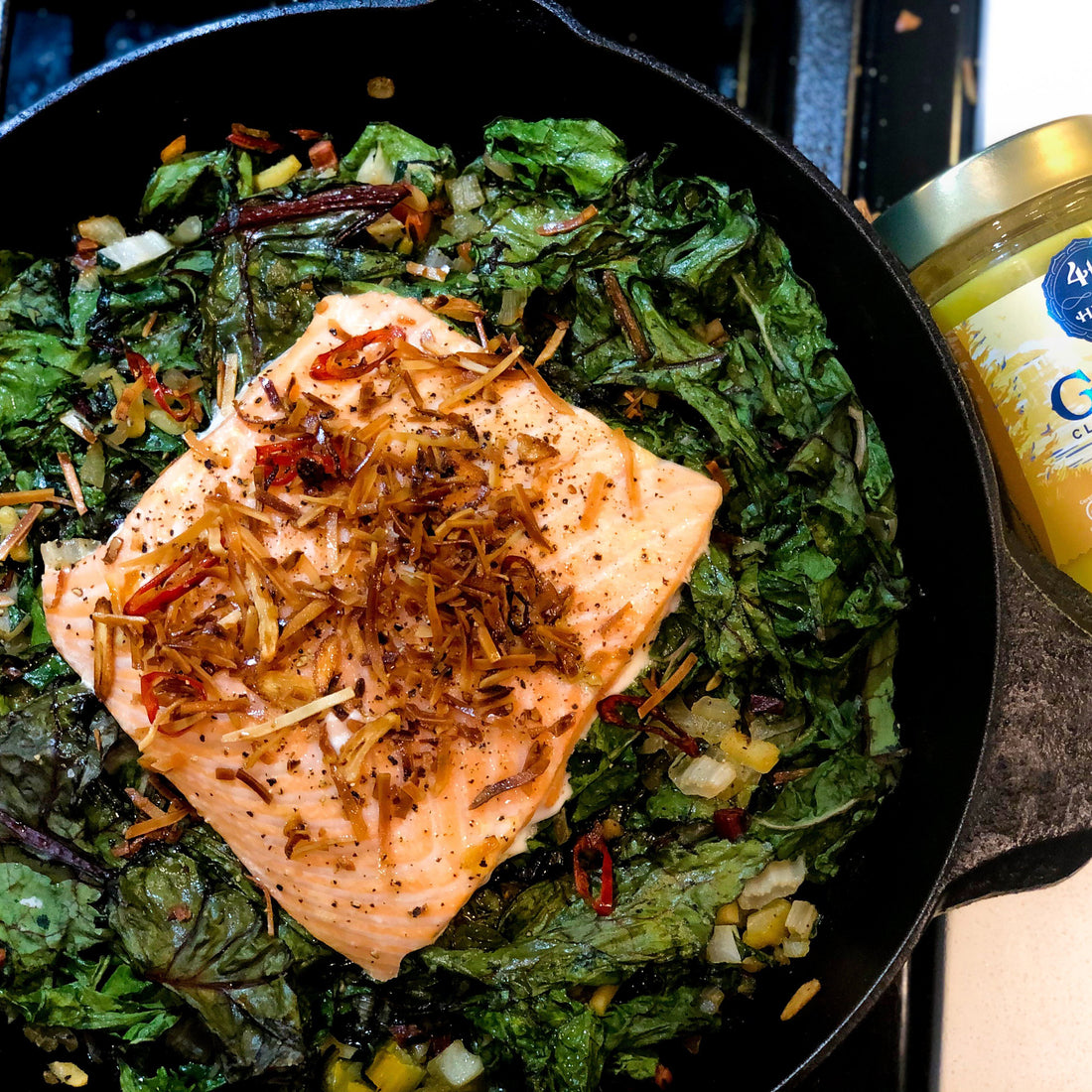 Turmeric Salmon with Rainbow Chard and Crispy Coconut Flakes